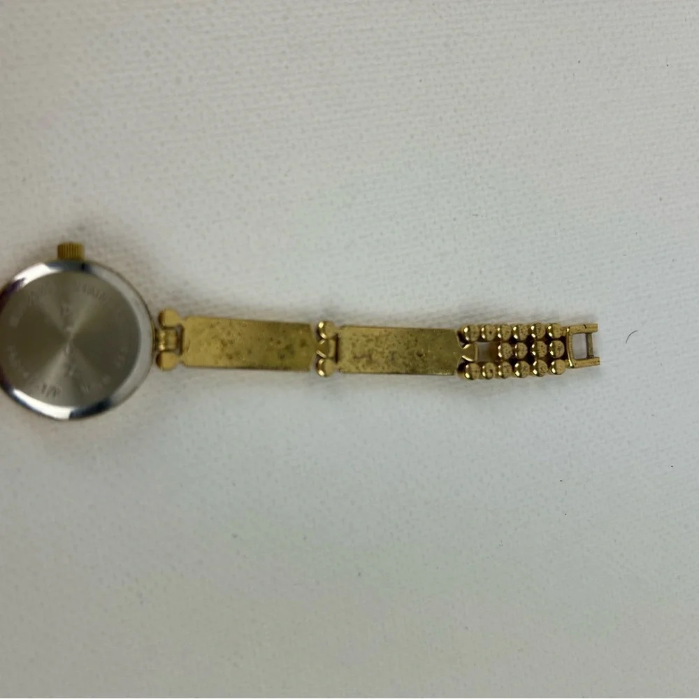 Elegant Avon Gold Tone Watch with Yellow Accents, 1